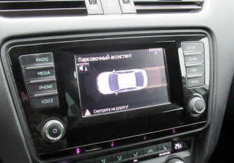 Подержанный автомобиль Skoda Octavia Liftback 2015 года (15 фото)