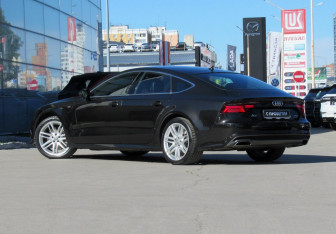 Подержанный автомобиль Audi A7 2014 года (7 фото)