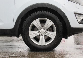 Подержанный автомобиль Kia Sportage 2012 года (9 фото)