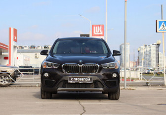 Подержанный автомобиль BMW X1 2016 года (2 фото)