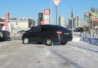 Подержанный автомобиль LADA (ВАЗ) Granta Sedan 2014 года (7 фото)