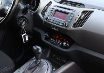 Подержанный автомобиль Kia Sportage 2014 года (18 фото)
