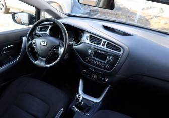 Подержанный автомобиль Kia Ceed Wagon 2014 года (13 фото)