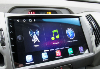 Подержанный автомобиль Kia Sportage 2011 года (14 фото)