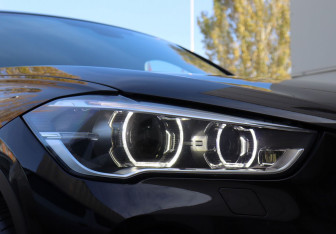 Подержанный автомобиль BMW X1 2016 года (10 фото)