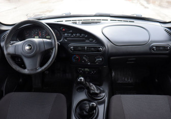 Подержанный автомобиль Chevrolet Niva 2013 года (12 фото)
