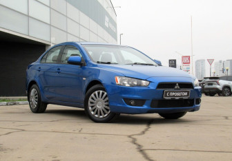 Подержанный автомобиль Mitsubishi Lancer Sedan 2010 года (3 фото)