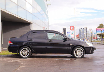 Подержанный автомобиль Mitsubishi Lancer Sedan 2006 года (4 фото)
