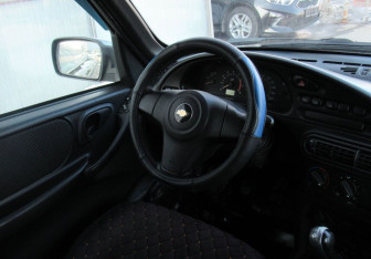 Подержанный автомобиль Chevrolet Niva 2014 года (13 фото)