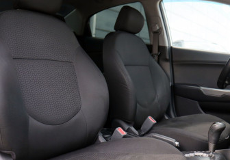Подержанный автомобиль Kia Rio Sedan 2015 года (11 фото)