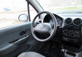 Подержанный автомобиль Daewoo Matiz 2010 года (12 фото)