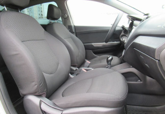 Подержанный автомобиль Kia Rio Sedan 2016 года (11 фото)