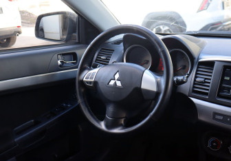 Подержанный автомобиль Mitsubishi Lancer Sedan 2008 года (13 фото)