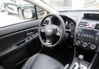 Подержанный автомобиль Subaru Impreza Hatchback 2013 года (14 фото)