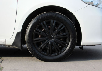 Подержанный автомобиль Toyota Corolla Sedan 2012 года (9 фото)