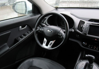 Подержанный автомобиль Kia Sportage 2012 года (12 фото)