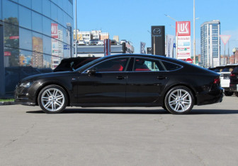 Подержанный автомобиль Audi A7 2014 года (8 фото)