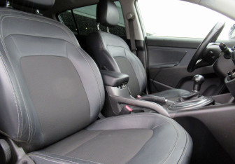 Подержанный автомобиль Kia Sportage 2012 года (11 фото)