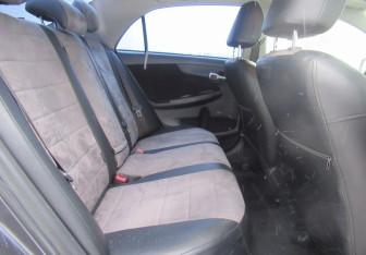 Подержанный автомобиль Toyota Corolla Sedan 2011 года (19 фото)