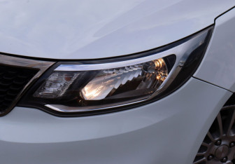 Подержанный автомобиль Kia Rio Sedan 2015 года (10 фото)