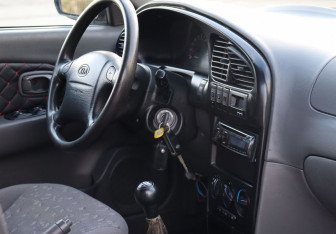 Подержанный автомобиль Kia Spectra Sedan 2008 года (14 фото)