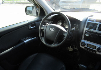 Подержанный автомобиль Kia Sportage 2008 года (12 фото)