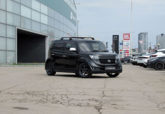 Подержанный автомобиль Toyota bB Compactvan 2011 года (3 фото)