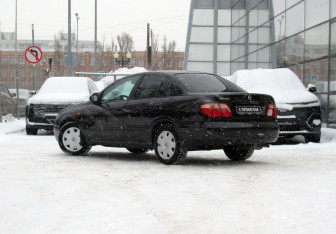 Подержанный автомобиль Nissan Almera Sedan 2004 года (7 фото)