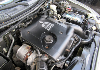 Подержанный автомобиль Mitsubishi Pajero Sport 2011 года (10 фото)