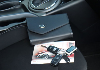 Подержанный автомобиль Kia Sportage 2014 года (22 фото)