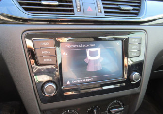 Подержанный автомобиль Skoda Rapid Liftback 2018 года (15 фото)