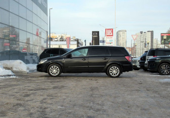 Подержанный автомобиль Opel Astra Wagon 2012 года (8 фото)