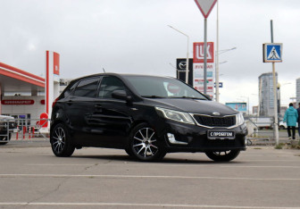 Подержанный автомобиль Kia Rio Hatchback 2013 года (3 фото)