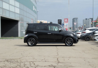 Подержанный автомобиль Toyota bB Compactvan 2011 года (4 фото)