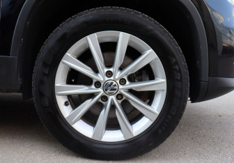 Подержанный автомобиль Volkswagen Tiguan 2014 года (9 фото)