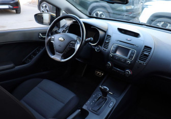 Подержанный автомобиль Kia Cerato Sedan 2013 года (12 фото)
