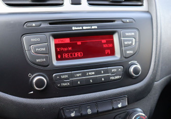 Подержанный автомобиль Kia Ceed Wagon 2014 года (15 фото)