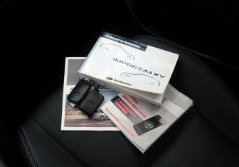 Подержанный автомобиль Subaru Impreza Hatchback 2013 года (18 фото)