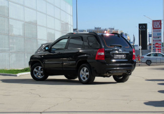 Подержанный автомобиль Kia Sportage 2008 года (7 фото)