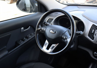 Подержанный автомобиль Kia Sportage 2014 года (13 фото)