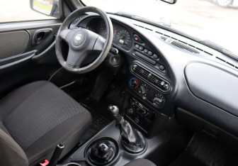 Подержанный автомобиль Chevrolet Niva 2013 года (11 фото)