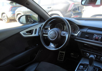 Подержанный автомобиль Audi A7 2014 года (13 фото)
