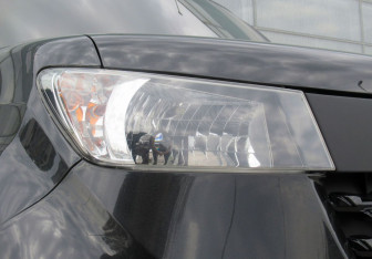 Подержанный автомобиль Toyota bB Compactvan 2011 года (9 фото)