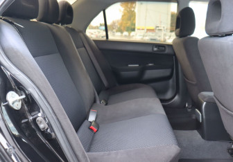 Подержанный автомобиль Mitsubishi Lancer Sedan 2006 года (19 фото)