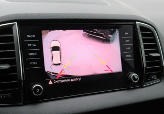 Подержанный автомобиль Skoda Karoq 2021 года (15 фото)